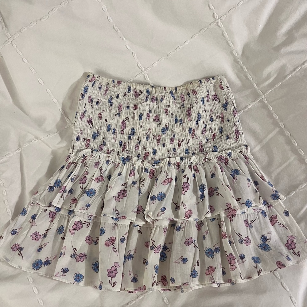 Isabelle’s Cabinet Skylar + Madison white and pink floral smocked mini skirt